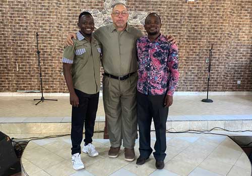 Bishop William Hawthorne and 2 men